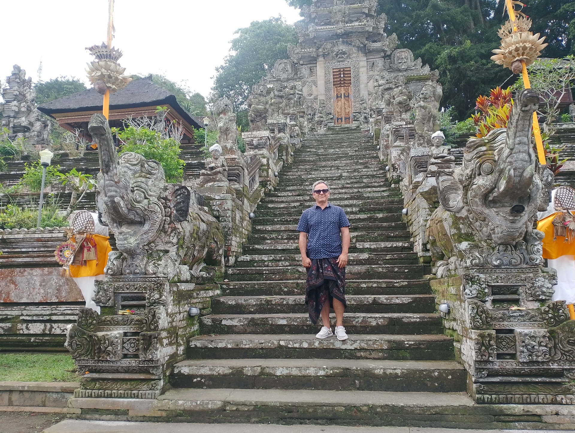 At the base of the guardian staircase — Pura Kehen, Bangli